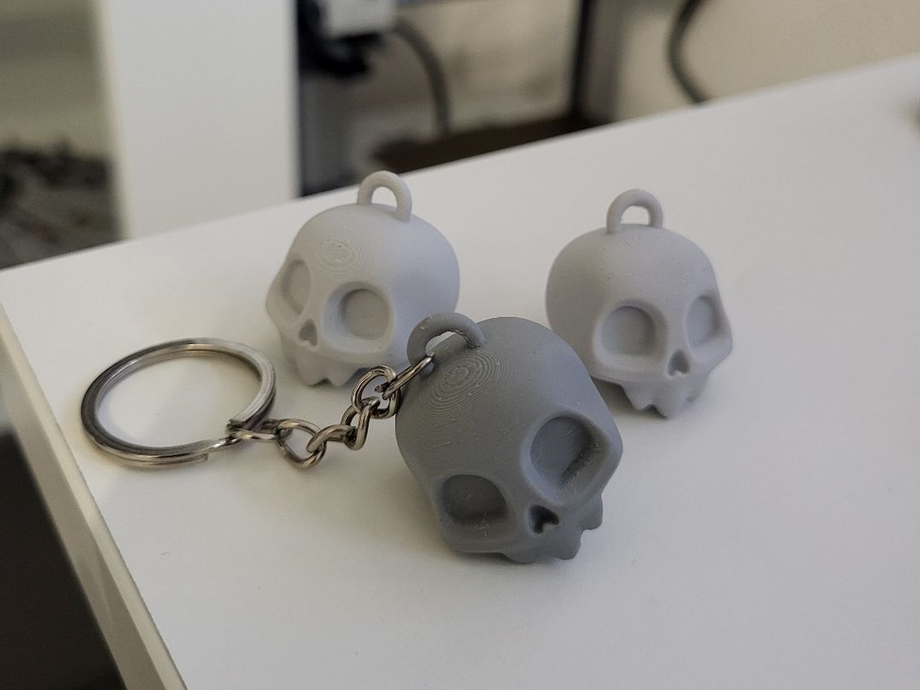 Porte-clés tête de mort mignonne - 1