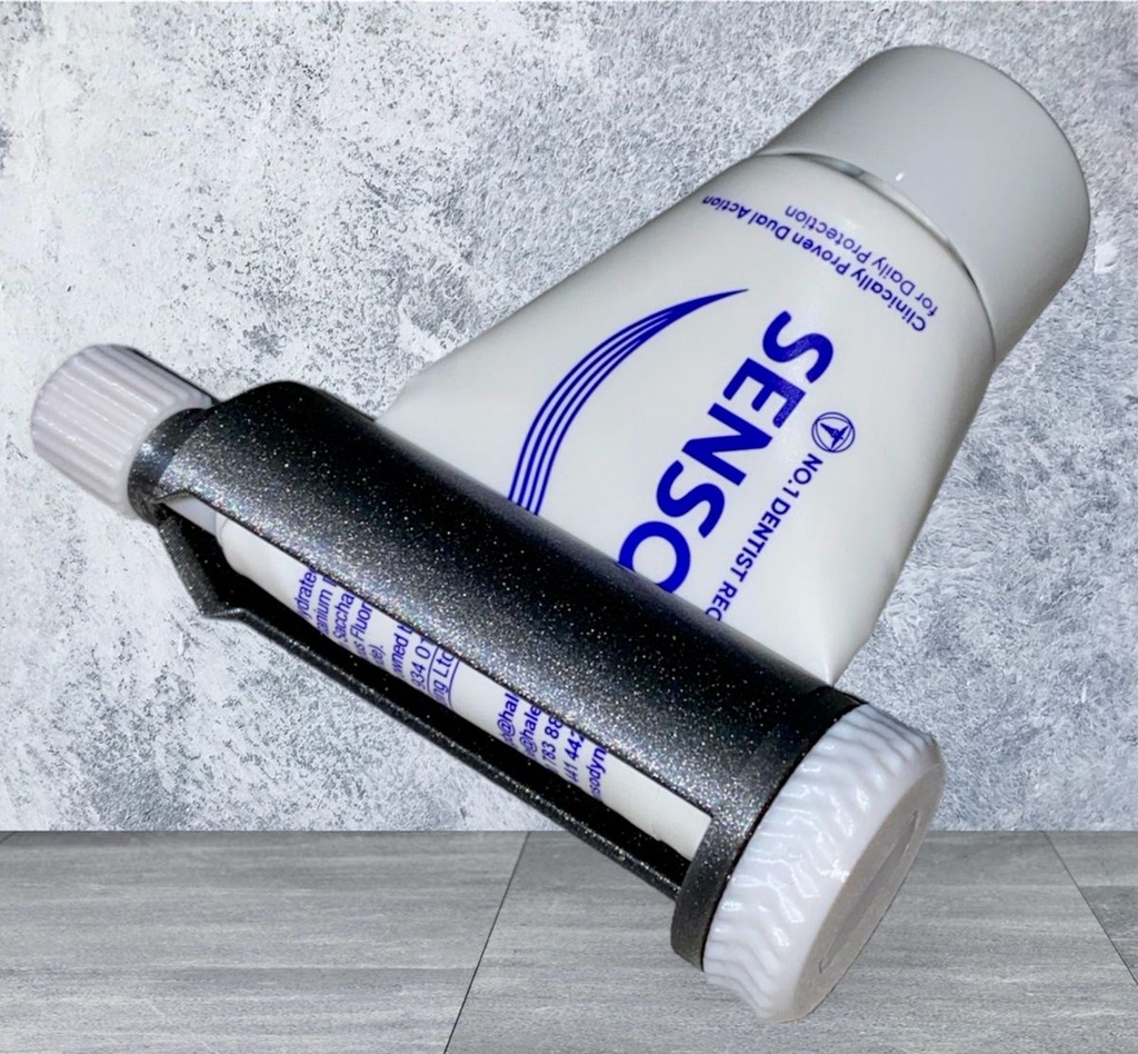 Presse-tube de dentifrice à cliquet